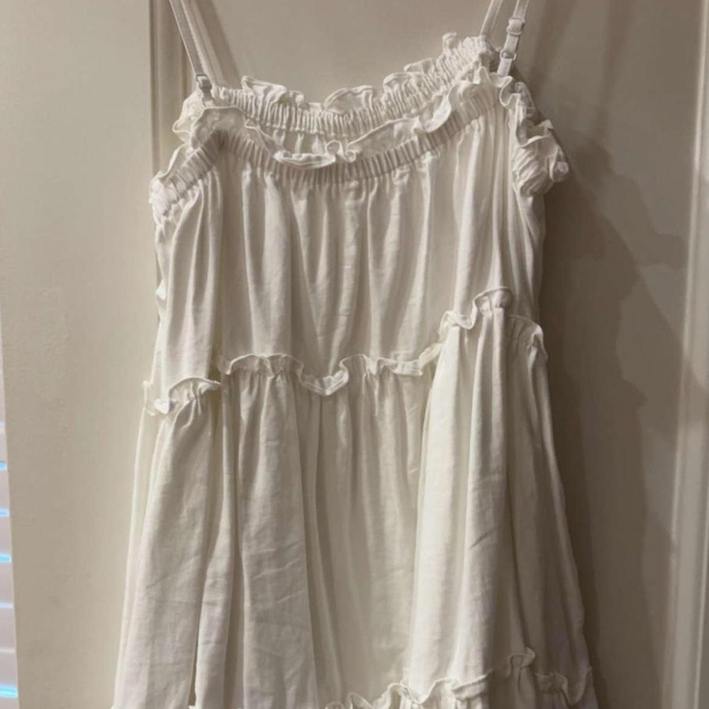 The Impeccable Pig White Ruffle Mini Dress